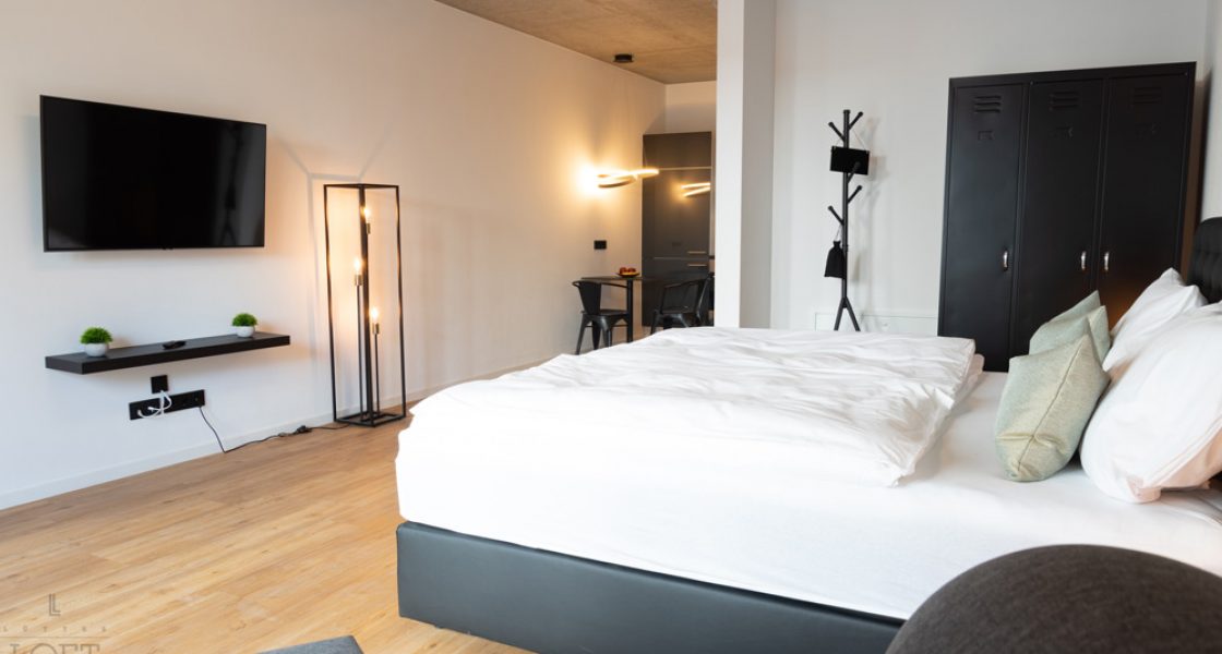 Lüttes Loft Eckernförde - Schlafzimmer und Küche